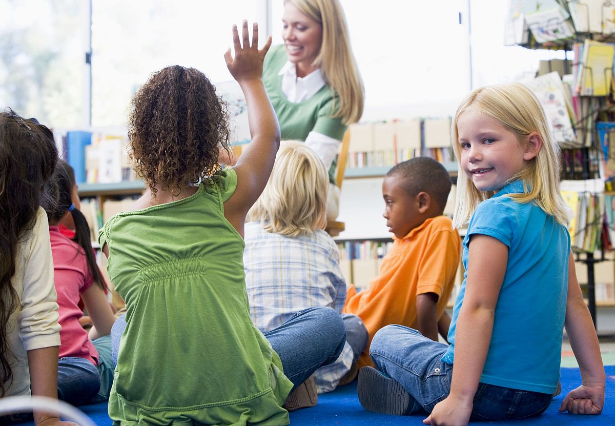 young children at library hour; concept: classroom changes because of COVID